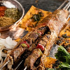 Печень с овощами завёрнутая сеточным жиром