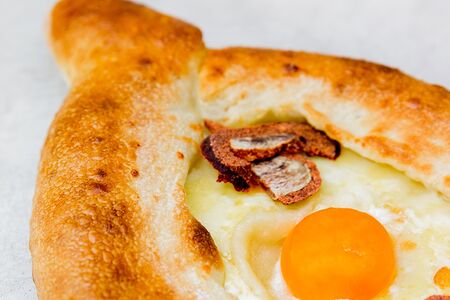 Хачапури по-аджарски с бастурмой