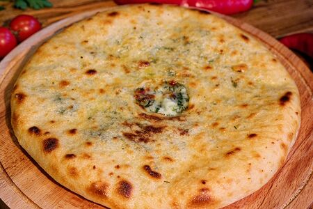 Осетинский пирог с сыром и зеленью