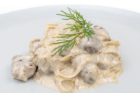 Сердечки куриные в сливочном соусе