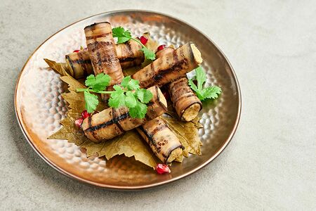 Рулеты из баклажанов с грецким орехом и гранатом