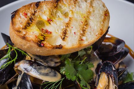 Мидии в сливочном соусе