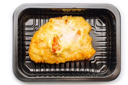 Свиная отбивная, запеченная с помидорами