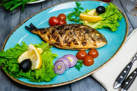 Дорадо на мангале