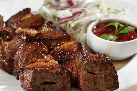 Говяжья печень в бараньей сетке