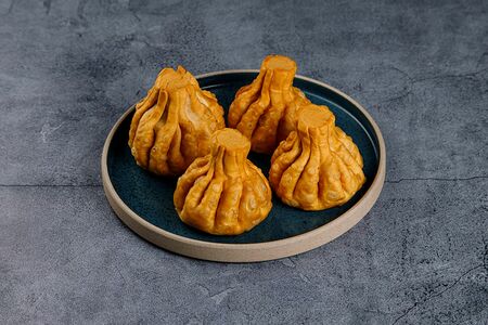 Жареные хинкали с вешенками и шампиньонами