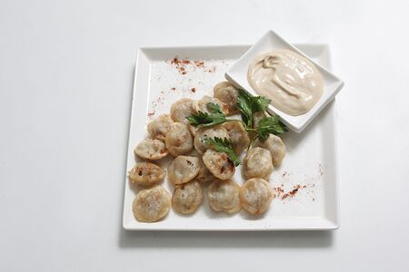 Пельмени жаренные самолепные