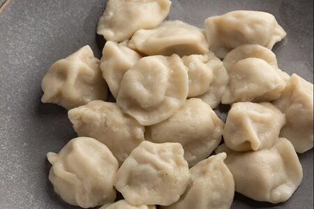 Вареные пельмени курица и свинина