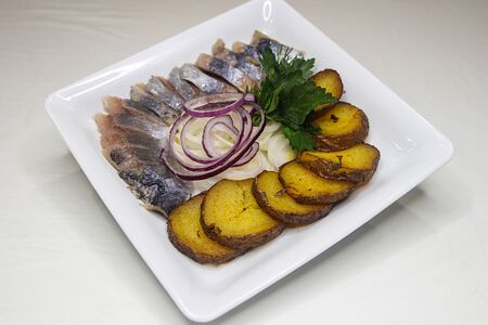 Сельдь с картофелем и луком