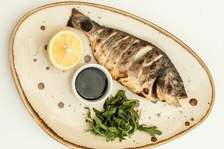 Дорадо на пару с зеленью