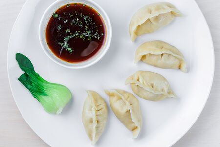 Китайские пельмени с говядиной и свининой отварные