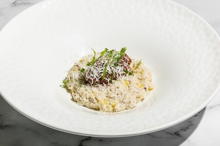 Ризотто с тартаром из говядины и чёрным трюфелем