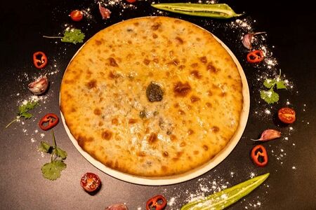 Осетинский пирог с сыром и свекольной ботвой