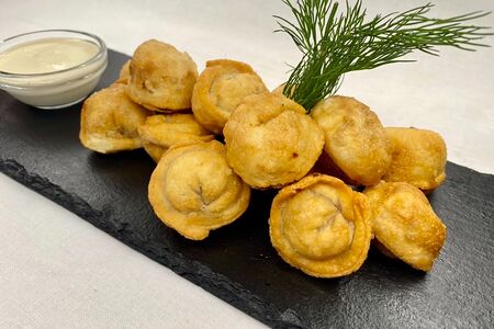 Пельмени жареные