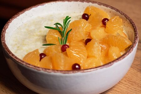 Каша Дружба с хурмой и мандарином