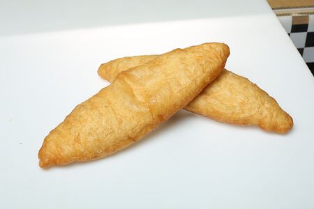 Пирожок с капустой жареный