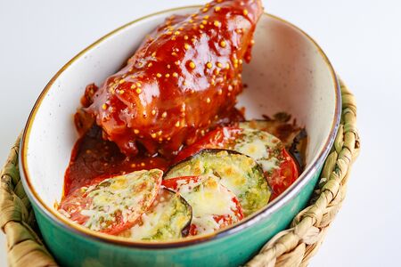 Баранья голень с овощным соте