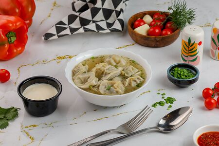 Пельмени в бульоне