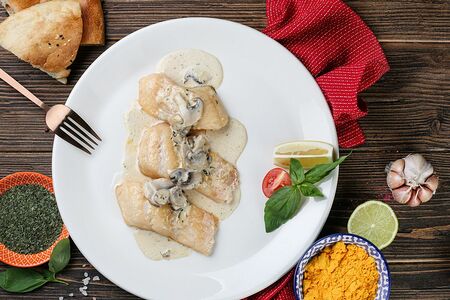 Филе судака, запеченное с овощами