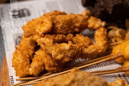 Кальмары в панировке с соусом Тартар