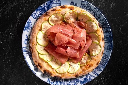 С пармским окороком