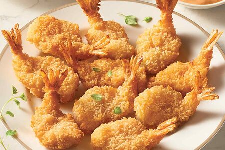 Креветки в панировке в кисло-сладком соусе