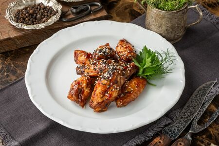 Куриные крылья в соусе барбекю