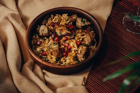 Орзо из свинины с гранатом