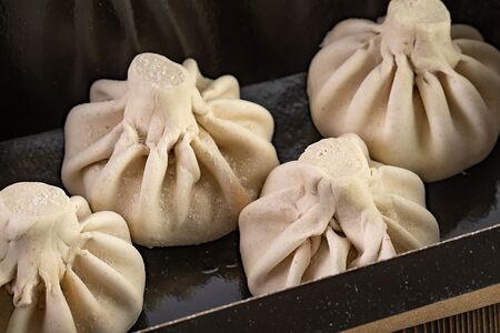 Хинкали с говядиной и свининой