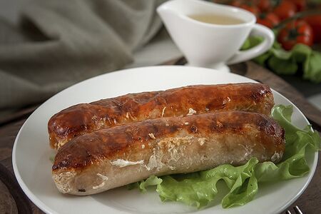 Колбаски жареные