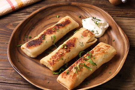 Блины с мясом и сметаной