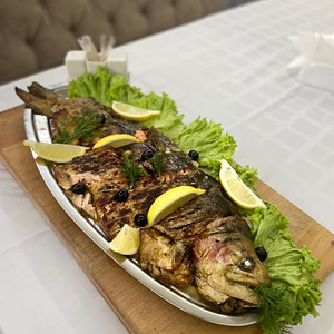 Форель запеченная с овощами