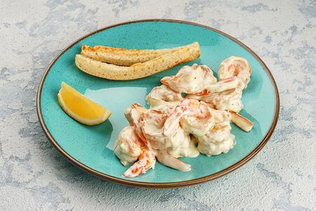 Королевские креветки в соусе дорблю