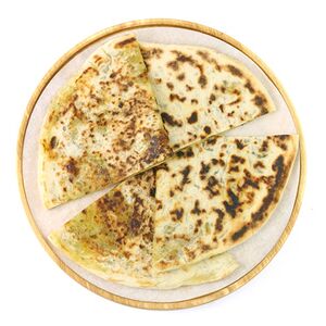 Восточная лепешка с сыром и зеленью