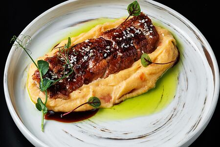 Угорь под трюфельным соусом