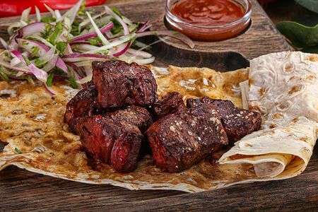 Говяжье сердце на мангале