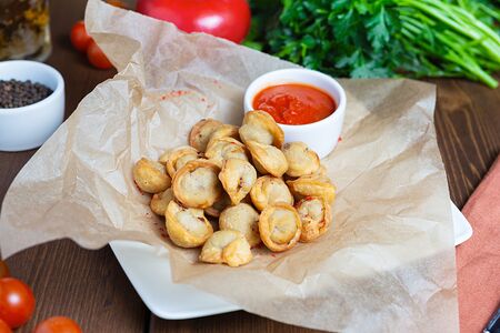 Жареные пельмени