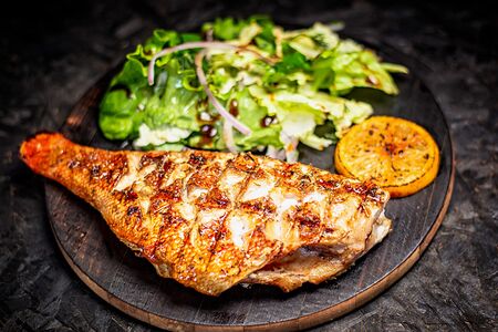 Морской окунь на мангале