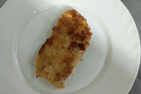 Минтай, тушенный со сметаной