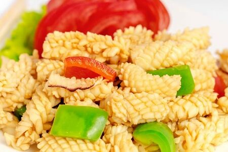Кальмары-ежики тушеные с овощами