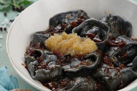 Пельмени с лососем и икрой щуки