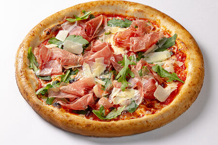 Пицца с пармской ветчиной и рукколой