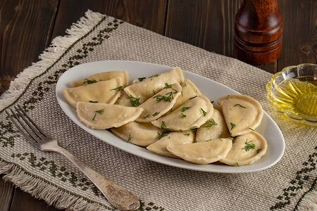 Вареники с картошкой и сливочным маслом