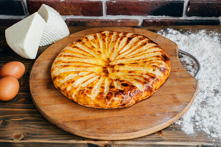 Осетинский пирог с сыром и помидорами