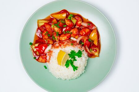 Кусочки курицы в кисло-сладком соусе