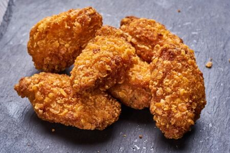 Куриные крылышки острые в панировке