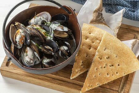 Мидии в сливочном соусе