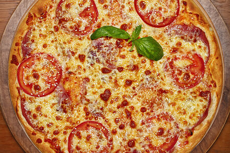 Пицца с ветчиной