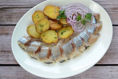 Сельдь с картофелем
