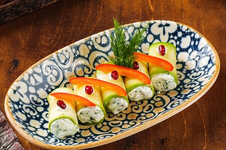 Рулетики из кабачков с начинкой из сыра фета, сметаны и зелени